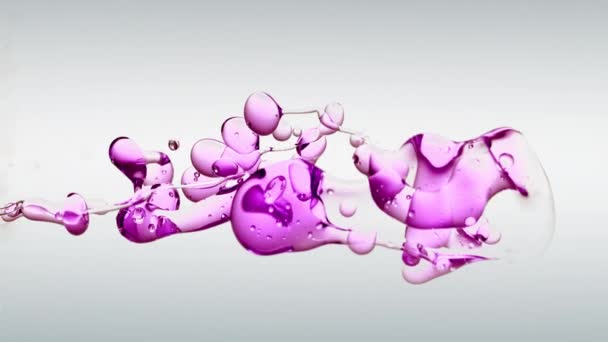 Oddly Satisfying Slow Motion Floating Vivid Purple Oil White Background — 图库视频影像