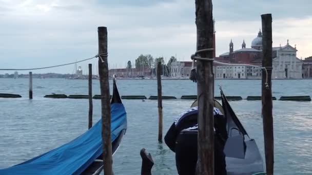 Person Tying Gondola Woods Pan Left Slow Motion Shot — Video