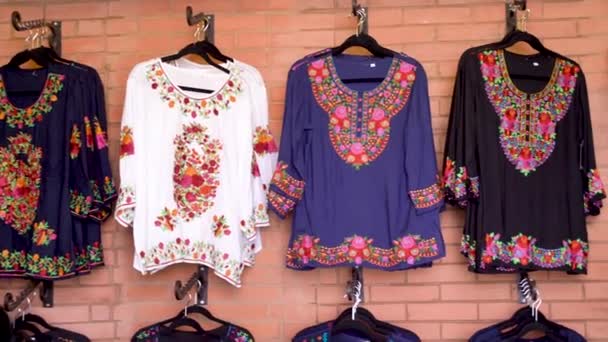 Camera Pans Left Showing Black Colorful Huipil Blouses Merida Mexico — Vídeo de stock