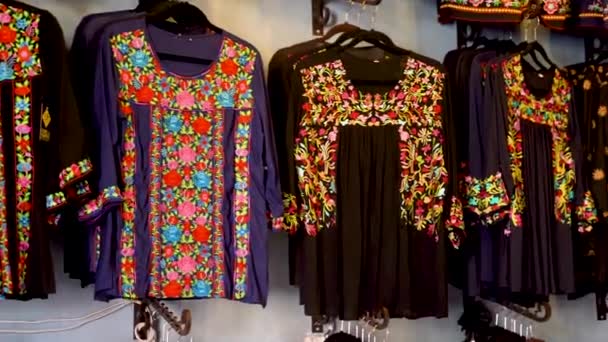 Camera Pans Left Showing Black Colorful Huipil Blouses Merida Mexico — Wideo stockowe