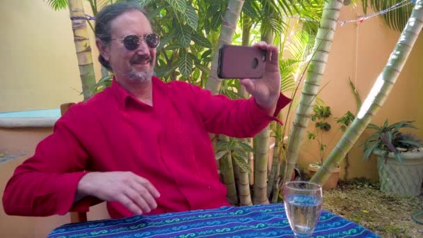 Closeup Mature Man Wearing Guayabera Shirt Takes Selfie Garden Computer — Αρχείο Βίντεο