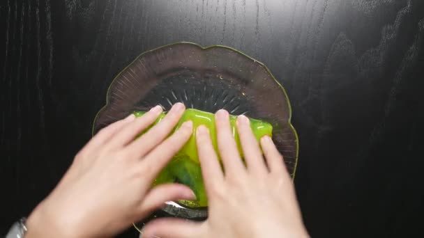 Kneading Yellow Slime Fingers Glass Bowl — Stock videók