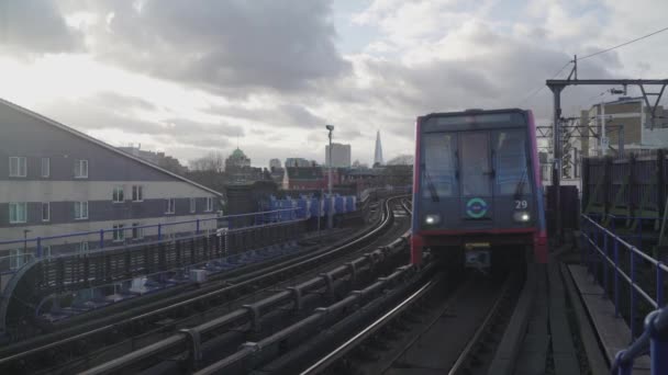 London Dlr Train Passing Cloudy Day — Stock video