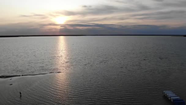 Aerial View River Sunset Tracking Back People Shoreline — Stok video