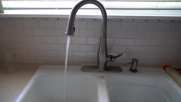 Wide Shot Water Runs Stainless Steel Faucet Kitchen Sink Front — 图库视频影像