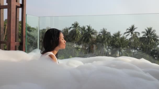 Asian Woman Taking Bubble Bath Jacuzzi Balcony Taking Deep Breath — Wideo stockowe