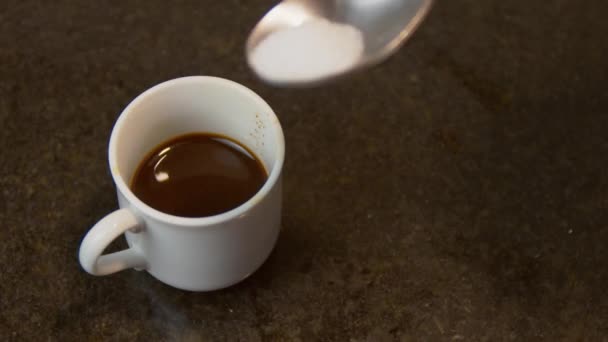 Sugar Being Added Coffee Metal Spoon Close — Vídeos de Stock