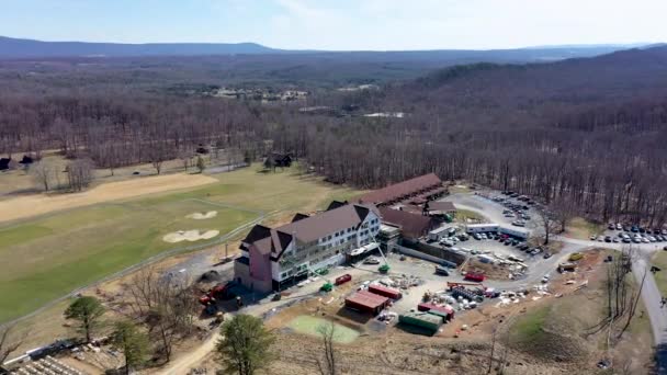 Aerial Ascent Camera Tilt Showing Cacapon State Park Lodge Expansion — стоковое видео