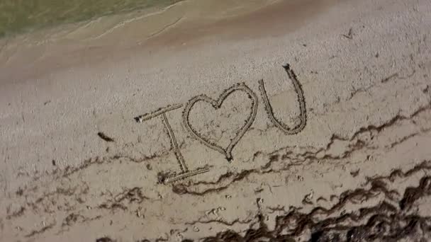 Love Written Sand Spinning Clockwise Showing Crazy Emotion — Video Stock