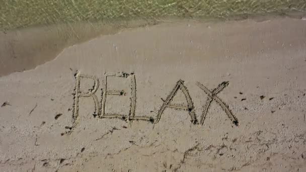 Relax Written Sand Spinning Counterclockwise — Stok video