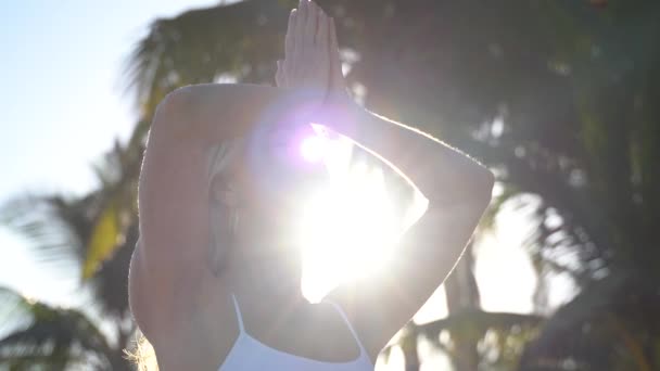 Closeup Backlit Side Shot Mature Woman Hands Prayer Lowering Them — Stockvideo