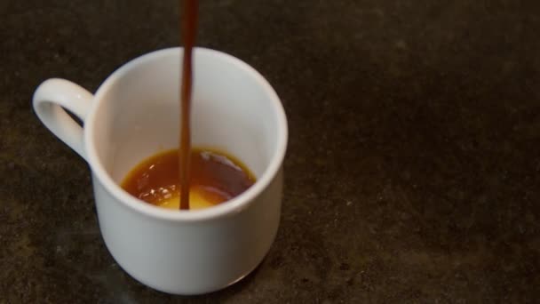 Pouring Delicious Moka Coffee Mug Closeup Shot — ストック動画