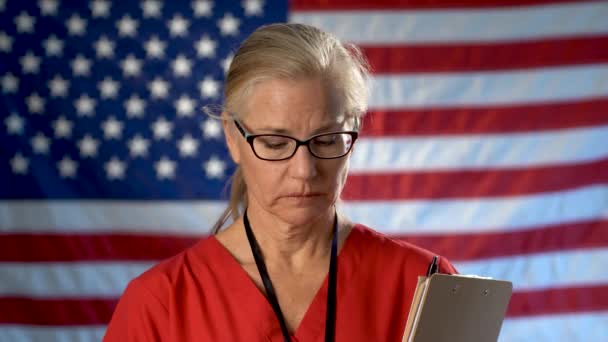 Portrait Nurse Set Out Focus Flag Showing Disappointment Sadness — Video Stock