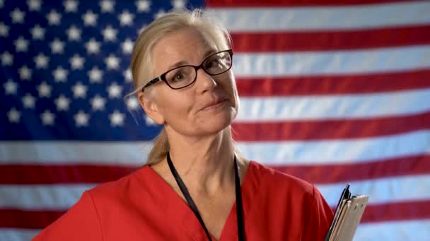 Portrait Nurse Showing Smile Approval Set Out Focus Flag — Video Stock