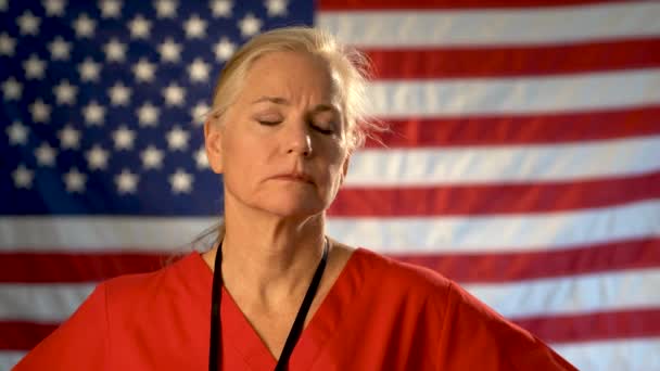 Medium Tight Portrait Nurse Looking Extremely Worried Sad American Flag — ストック動画