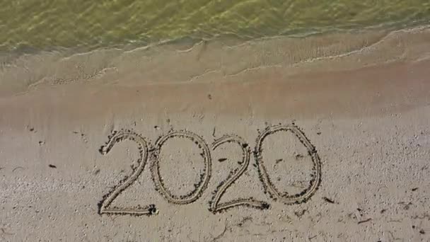 Twenty Twenty Written Sand Gets Smaller Size Aerial Camera Moves — Video Stock