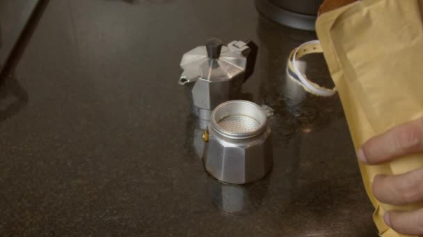 Unidentified Hand Holding Spoon Ground Coffee Beans Putting Moka Pot — Stock video
