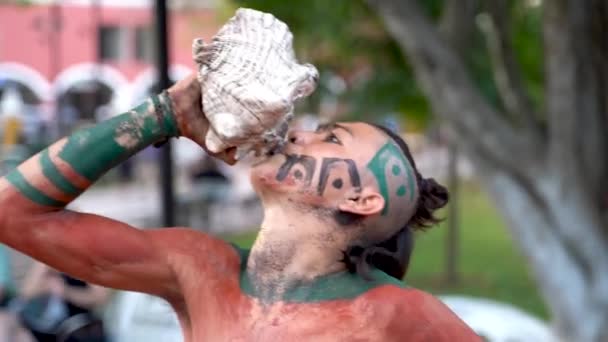 Extreme Closeup Mayan Aztec Dancer Playing Conch Shell Sacred Dance — стоковое видео