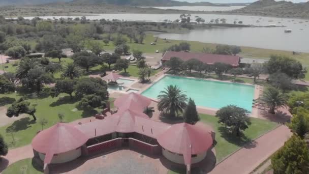 Aerial Fly Lodge Pools Tennis Courts Summer Time — Stock Video