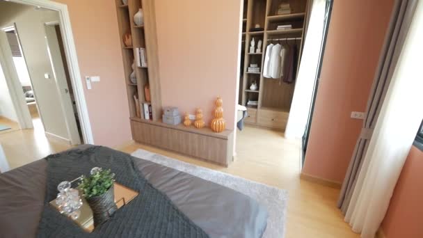 Modern Stylish Master Bedroom Walk Closet Decoration Orange Wallpaper — стоковое видео