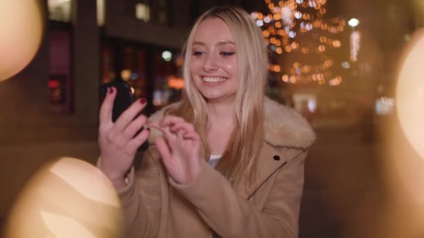 Young Woman Chats Friend Video Chat Whilst Smiling Waving Slow — Vídeo de Stock