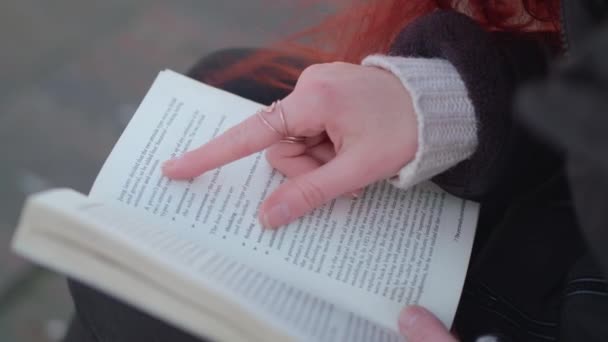 Young Woman Reads Book Read Hair Blowing Wind — 图库视频影像