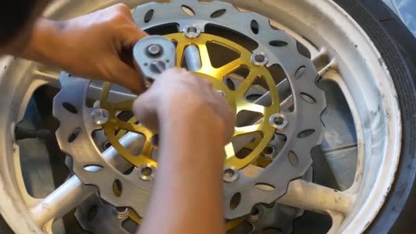 Close Footage Mechanic Working Disc Brake Installation Motorcycle — Stockvideo