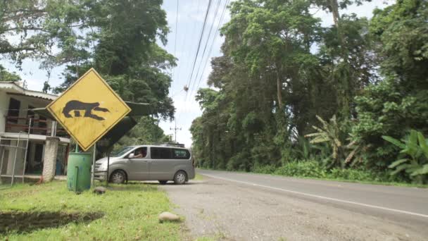 Sloth Sign Road Costa Rica Car Mini Van Starts Engine — Vídeo de stock