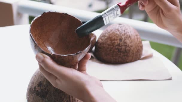 Female Hands Crafting Coconut Shells Home Brushing Them Oil — Vídeos de Stock