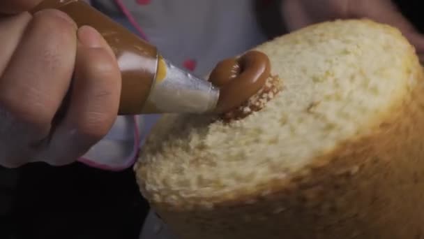 Pastry Chef Adding Dulce Leche Caramel Sponge Cake — Stockvideo