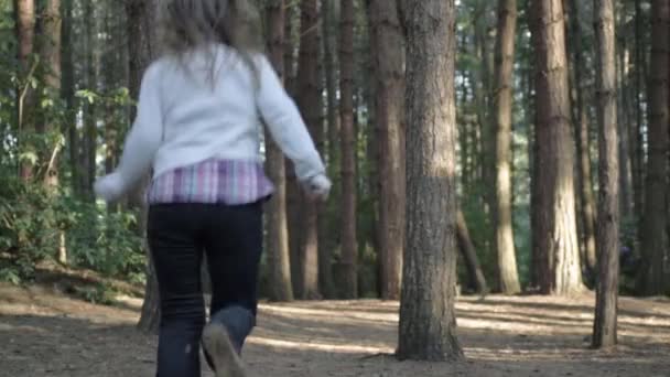 Woman Running Empty Pine Forest Walking Stick Wide Shot — Stockvideo