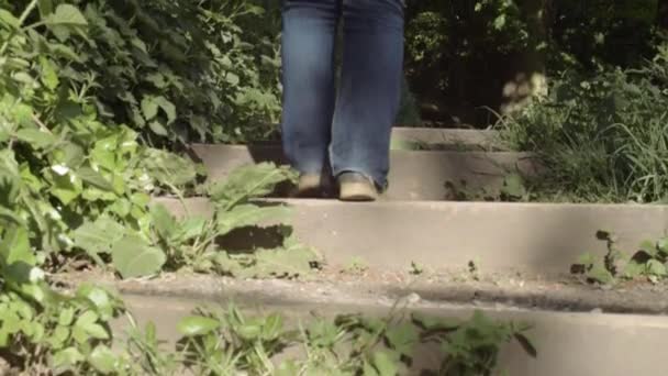 Legs Walking Outdoor Wooden Staircase Entrance Tilting Shot — Stockvideo