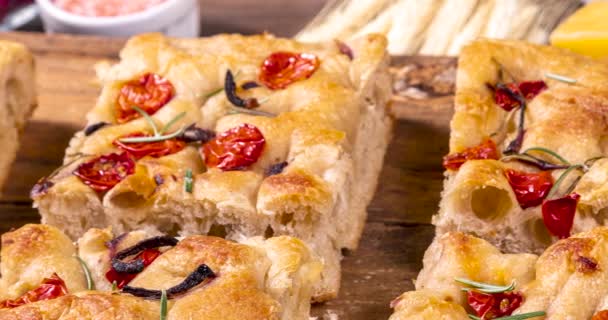 Traditional Italian Focaccia Pepperoni Cherry Tomatoes Black Olives Rosemary Onion — Video Stock