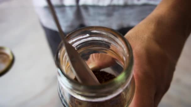 Man Using Spoon Adding Coffee Powder — Stockvideo