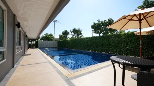 Peaceful Sunny Swimming Pool Area — Video