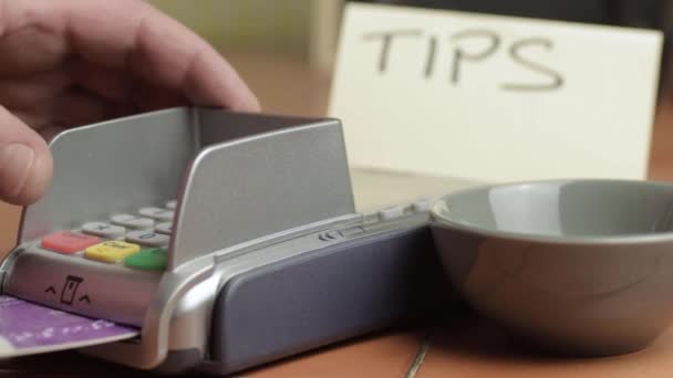 Paying Card Next Tipping Bowl — стоковое видео