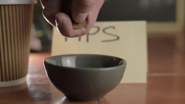 Hands Putting Coins Tip Jar Close Shot — Αρχείο Βίντεο