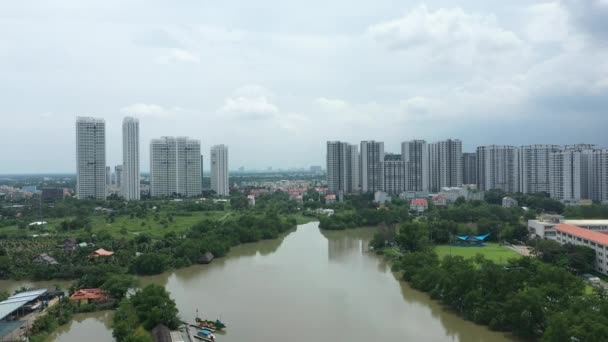 Rising Drone Shot Flying River Ultra Modern Residential High Rise — Wideo stockowe