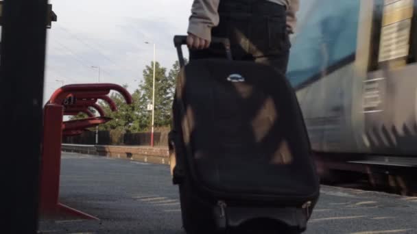 Female Passenger Wheels Suitcase Train Platform Train Goes Wide Shot — 图库视频影像