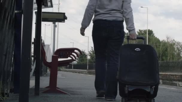 Woman Wheels Suitcase Train Platform Wide Shot — 图库视频影像