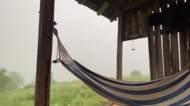 Hanging Hammock Wooden Swing Relaxing Summer House Cottage Terrace Foggy — Stockvideo