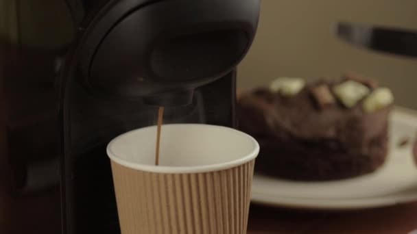 Coffee Machine Filling While Serving Chocolate Cake Medium Shot — Stockvideo