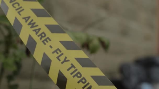 Illegal Fly Tipping Waste Investigation Tape Close Shot — Stockvideo