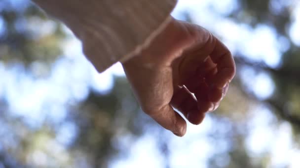 Single Hand Reaching Out Bokeh Lights Background Medium Shot — Wideo stockowe