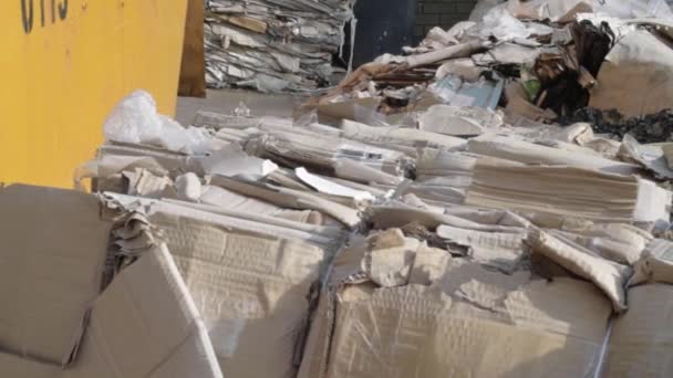 Cardboard Waste Paper Wide Overhead Panning Shot — стоковое видео