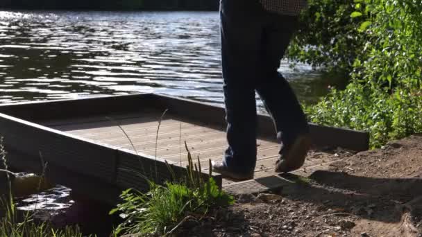 Woman Solitude Walks Pier Lake Medium Shot — Vídeo de Stock