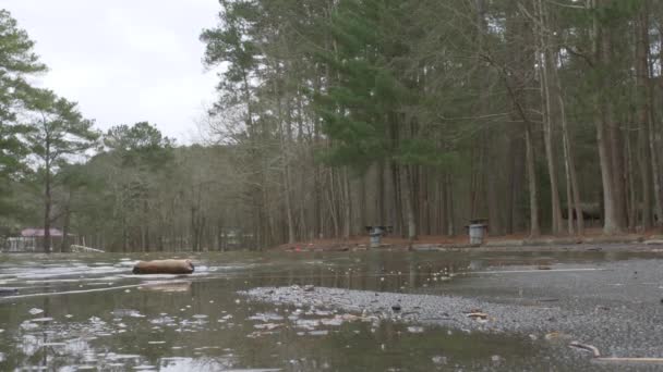 Flooded Parking Lot Asphalt Water Rushing Slow Motion — ストック動画