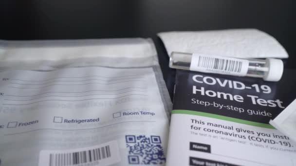 Close Shot Covid Coronavirus Home Test Kit Guide Test Tube — Vídeo de stock