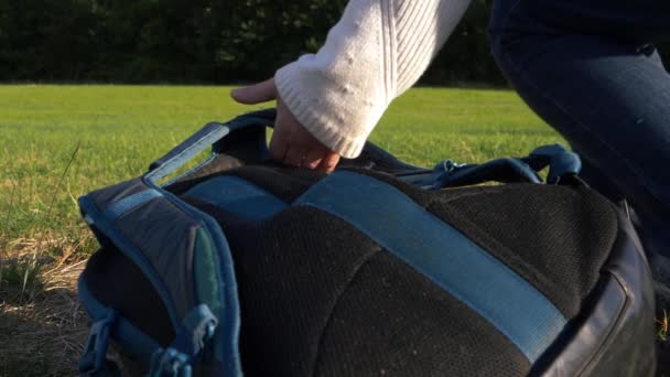 Hiker Picks Rucksack Countryside Close Shot — Wideo stockowe