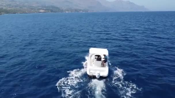 Powerboat Splashing Waves Leaving Wake Calm Blue Sea Scopello Sicily — стоковое видео